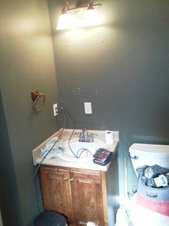 Before & After Bathroom Remodel with Tub to Shower Conversion in Eclectic, AL (2)
