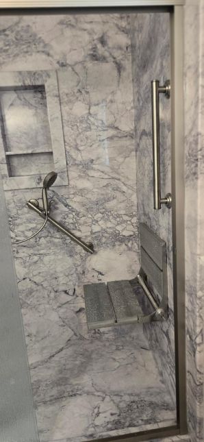 Tub to Walk-in Shower Conversion in Montgomery, AL, Mr McClendon, a Vietnam Vet. It was a very Small Bath area, but we did what we had to do to help them, and they love it  (Charlie Jr, Mike, & Landon) (4)