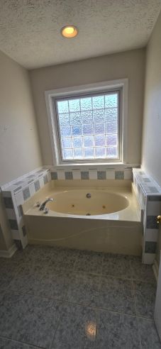 Bathroom Remodeling in Wetumpka, AL    Full Remodel Painting, Flooring, New Tub to Shower Conversion, New High Rise Toilet, New Vanity with Lighting, and the Conversion of the Old Shower Area into a Closet area    (Charlie Jr, Mike, and Landon) (4)