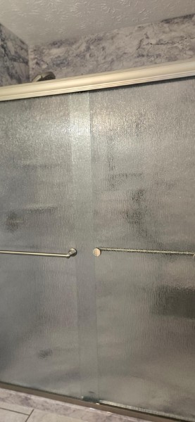 Tub to Walk-in Shower Conversion in Montgomery, AL, Mr McClendon, a Vietnam Vet. It was a very Small Bath area, but we did what we had to do to help them, and they love it  (Charlie Jr, Mike, & Landon) (5)