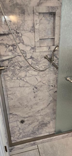Tub to Walk-in Shower Conversion in Montgomery, AL, Mr McClendon, a Vietnam Vet. It was a very Small Bath area, but we did what we had to do to help them, and they love it  (Charlie Jr, Mike, & Landon) (3)
