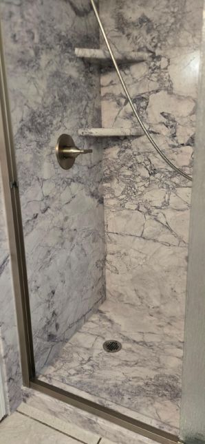Tub to Walk-in Shower Conversion in Montgomery, AL, Mr McClendon, a Vietnam Vet. It was a very Small Bath area, but we did what we had to do to help them, and they love it  (Charlie Jr, Mike, & Landon) (2)