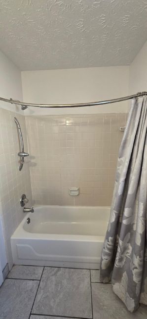 Tub to Walk-in Shower Conversion in Montgomery, AL, Mr McClendon, a Vietnam Vet. It was a very Small Bath area, but we did what we had to do to help them, and they love it  (Charlie Jr, Mike, & Landon) (1)
