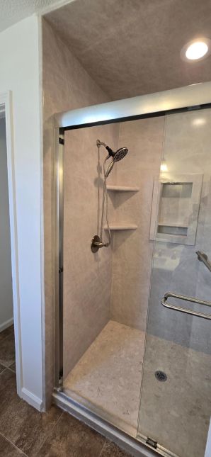 Bathroom remodel in Wetumpka, AL
(Charlie Jr. & Mike)
Tub to Shower Conversion, New Vanity, New Flooring, and Paint Job. (4)