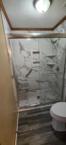 Before & After Tub to Shower Conversion in Wetumpka, AL
(Charlie Jr and Mike)
New Luxury Bathroom Vinyl Flooring Installed (2)