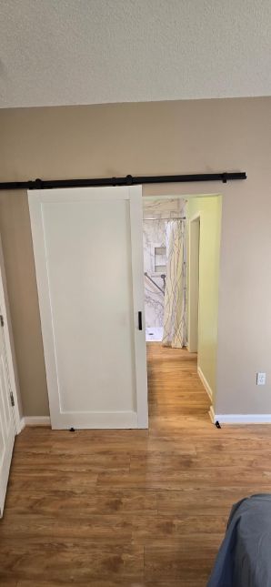 Full Bathroom Remodel in Plantersville, AL (Charlie Jr, Mike, and Landon)
 New Tub to Shower, New Closet Area, New Flooring, New Lighting, Painting, and a Barn Door for the Entry Door. (8)