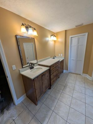 Bathroom Remodeling in Deatsville, AL

Full Remodel, Garden Tub Conversion into a Shower, The Old Shower into a New Linen Closet, New Vanity, New Tile Flooring, and a Full Paint Job.

(Charlie Jr., Mike, & Landon) (6)